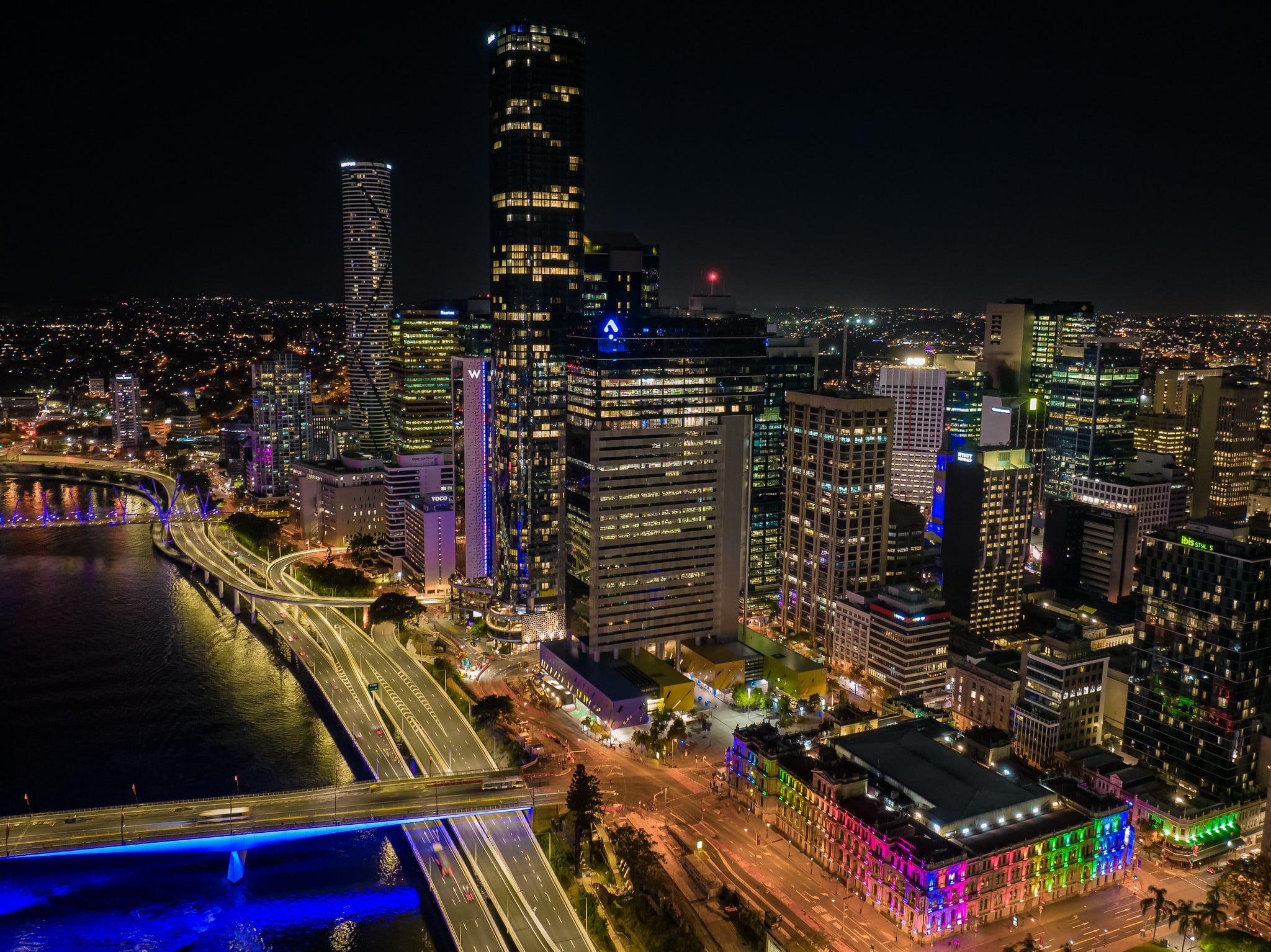 Timelapse photography still frame showing aerial view of Perth city lit up at night