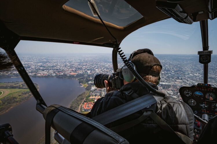 Photographer in helicopter